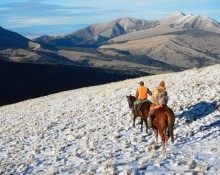 Hunters on horseback