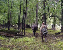 Duck hunters hiking to blind